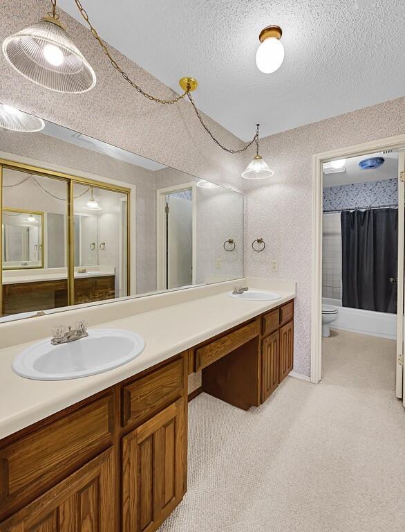 112 Pleasant Grove Lane Waco, TX 76712 - Photo 22 of 34 a bathroom with a sink a double vanity and a mirror