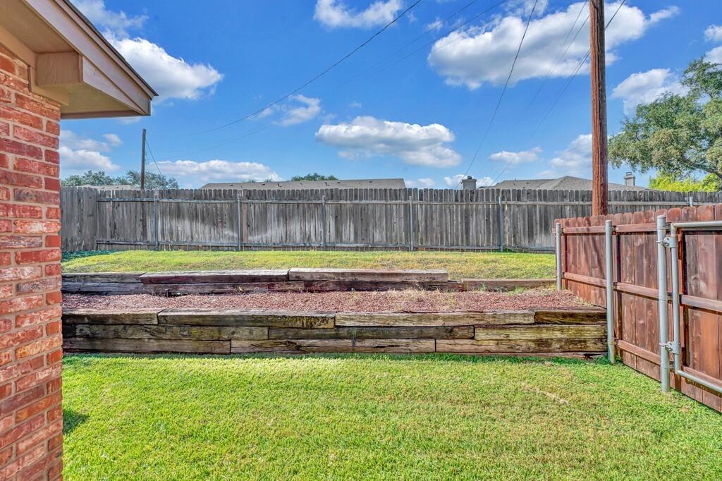 112 Pleasant Grove Lane Waco, TX 76712 - Photo 29 of 34 a view of a backyard with a swimming pool