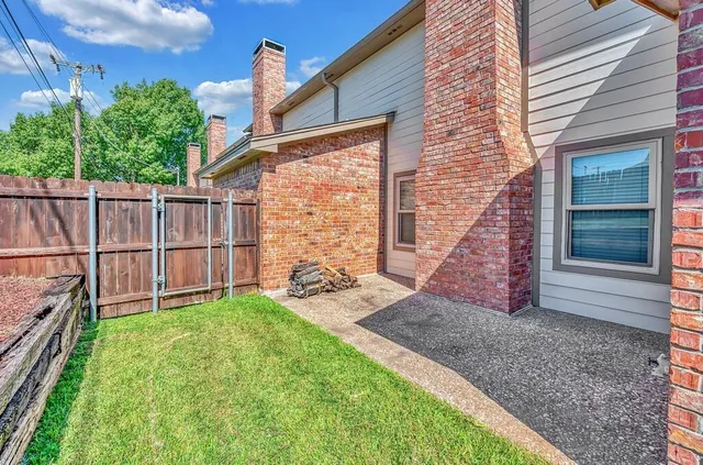 a view of a backyard with a garden