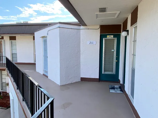 a view of an entryway with staircase