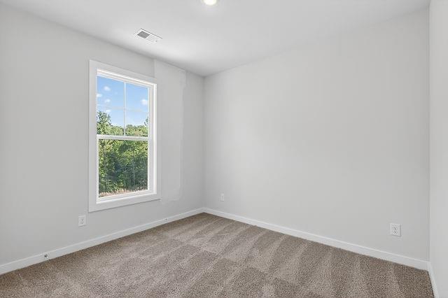 2562 Harbor Ridge Pass Gainesville, GA 30507 - Photo 16 of 27 an empty room with a window
