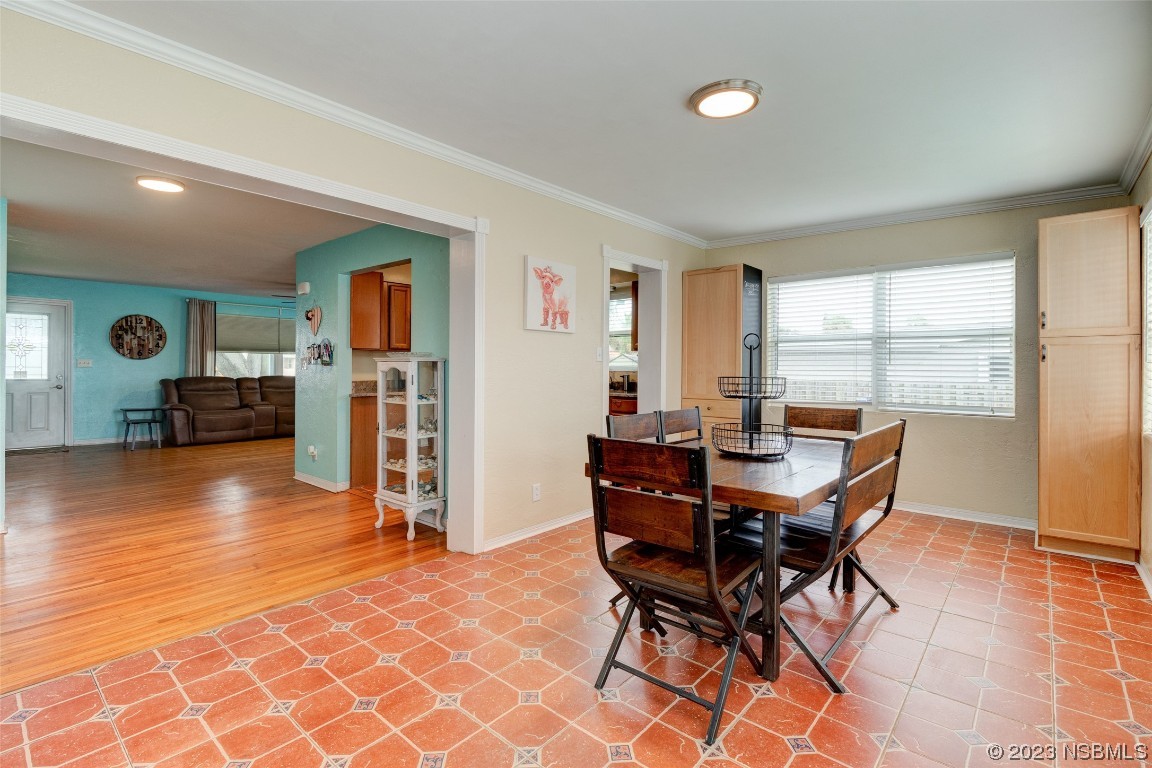 923 Peninsula Drive Ormond Beach, FL 32176 - Photo 11 of 33 a view of a workspace with furniture and a window