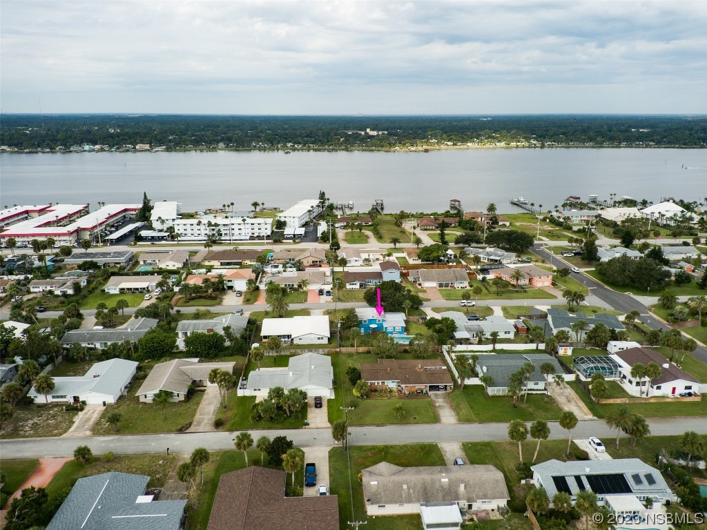 923 Peninsula Drive Ormond Beach, FL 32176 - Photo 32 of 33 a view of a lake and a city