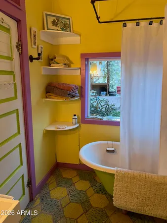 a bathroom with a sink and a shower