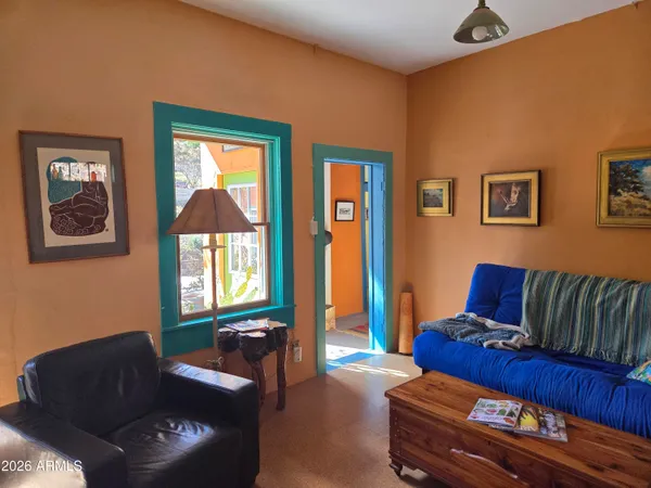 a living room with furniture and a window