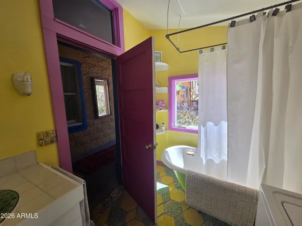 a bathroom with a sink and bathtub