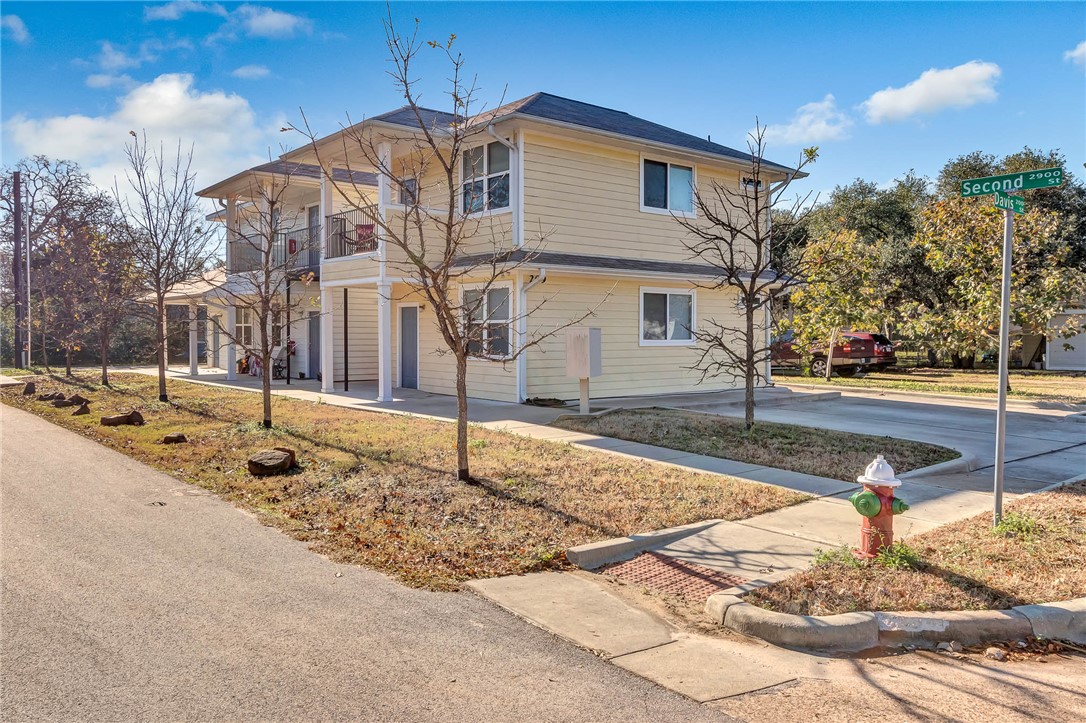209 Davis Street, Unit MULTIPLE S AVAILABLE Bryan, TX 77801 - Photo 11 of 11 a front view of a house with street