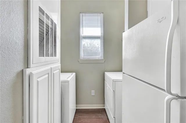 a view of hallway with windows
