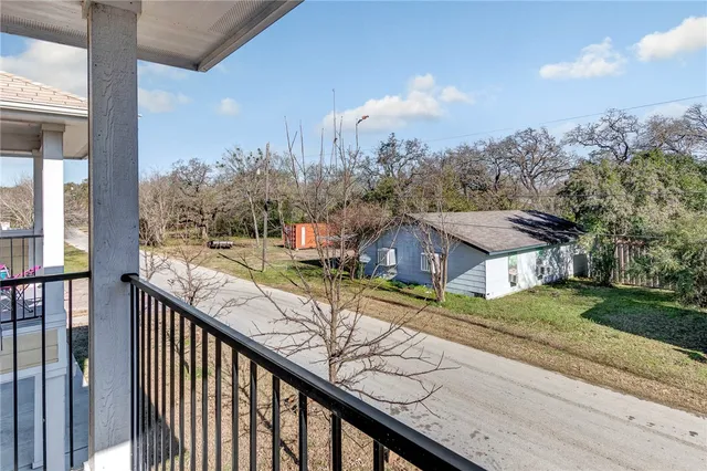 a view of a street from a balcony
