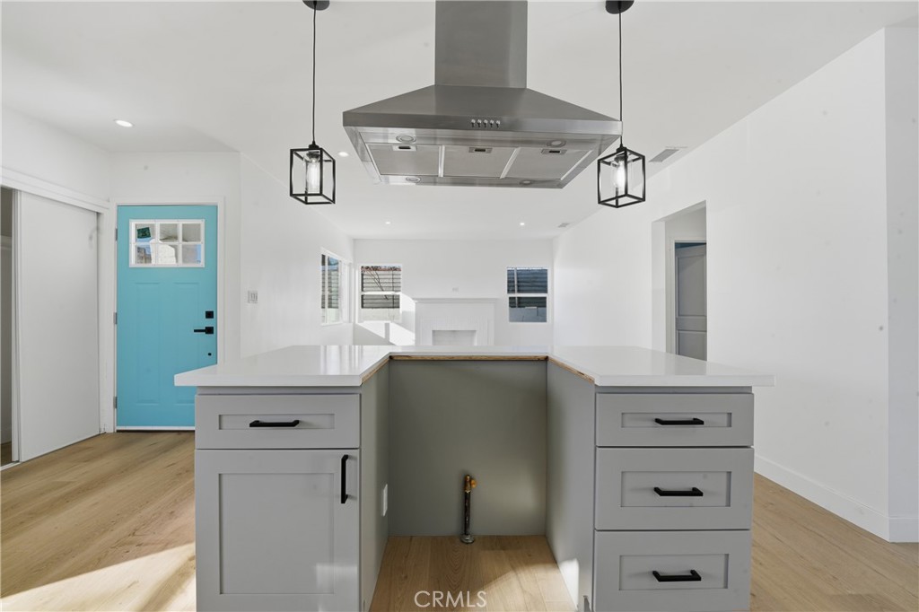 1736 North McDivitt Avenue Compton, CA 90221 - Photo 16 of 30 a view of a hallway with chandelier