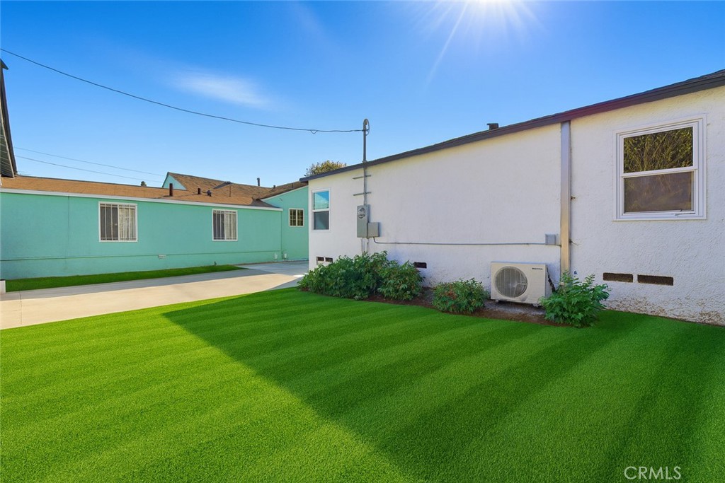 1736 North McDivitt Avenue Compton, CA 90221 - Photo 30 of 30 a front view of a house with garden