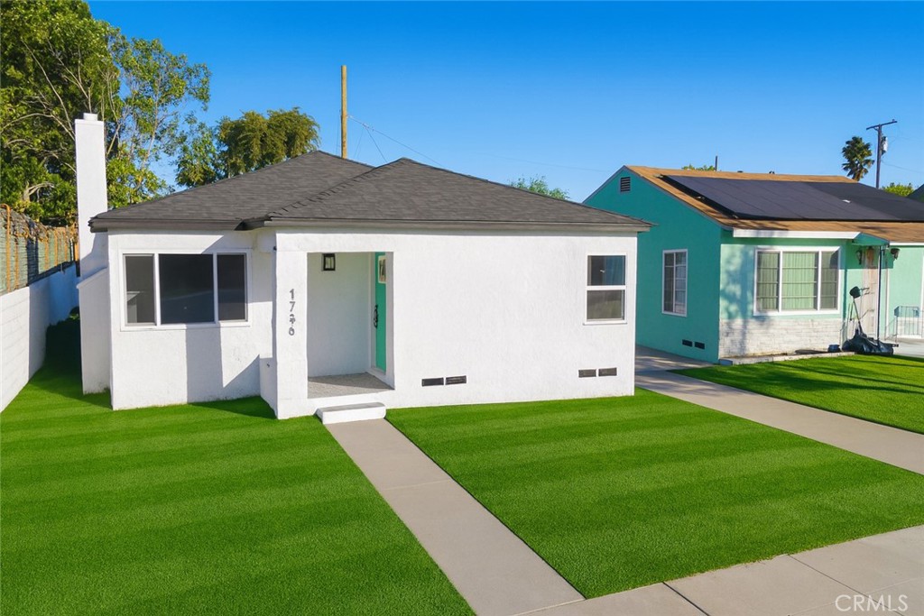 1736 North McDivitt Avenue Compton, CA 90221 - Photo 3 of 30 a view of a house with a yard