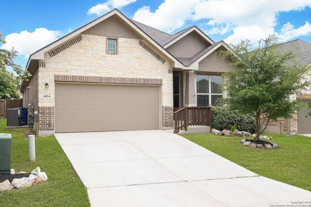 a front view of house with yard