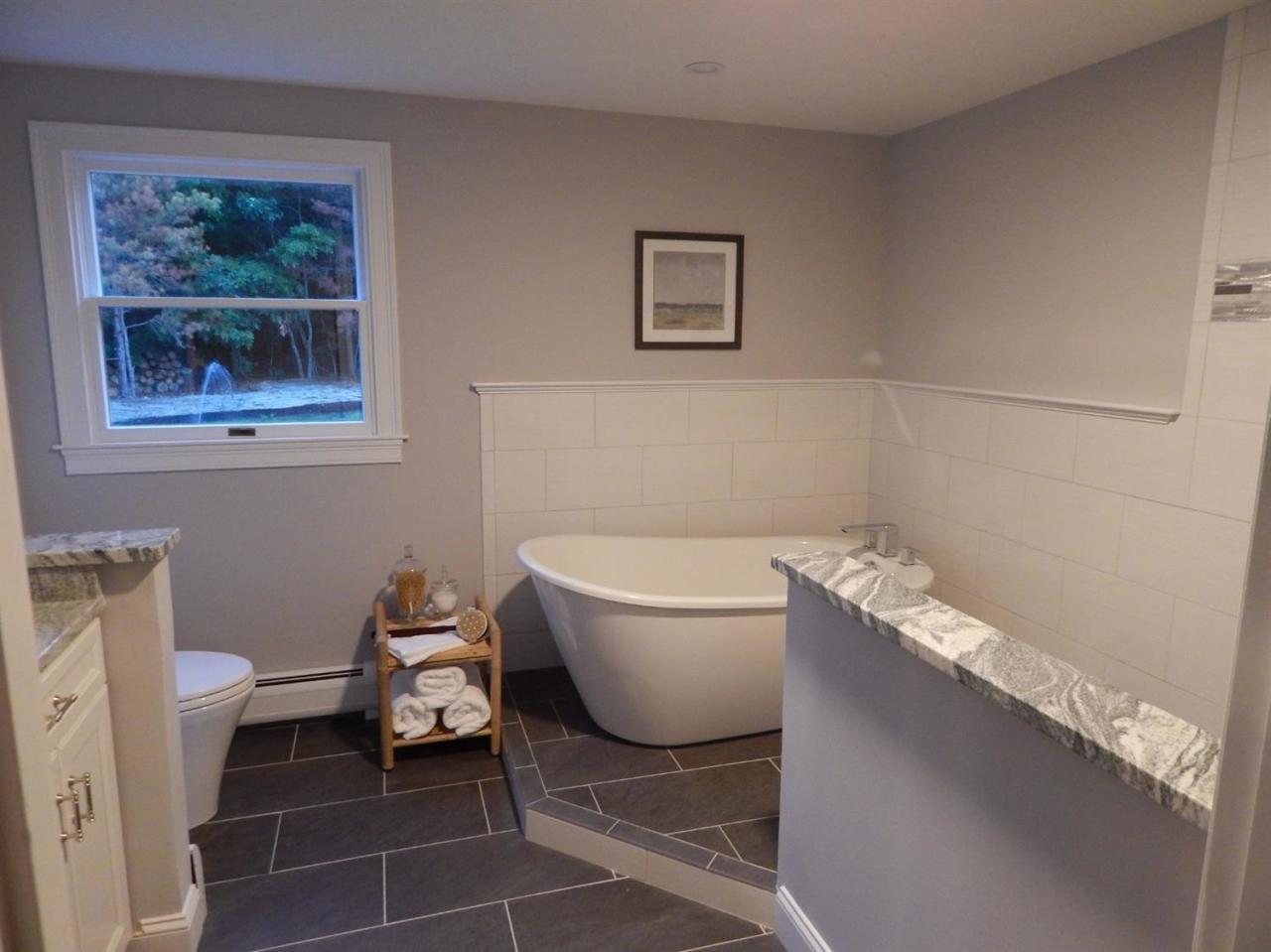 163 Fuller Road Centerville, MA 02632 - Photo 15 of 23 a bathroom with a granite countertop toilet and a sink