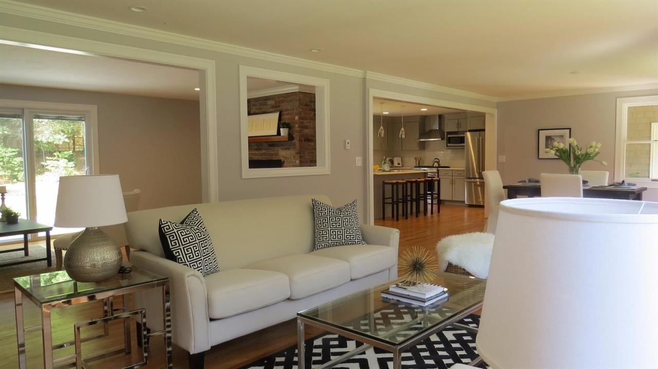 163 Fuller Road Centerville, MA 02632 - Photo 2 of 23 a living room with furniture and a table