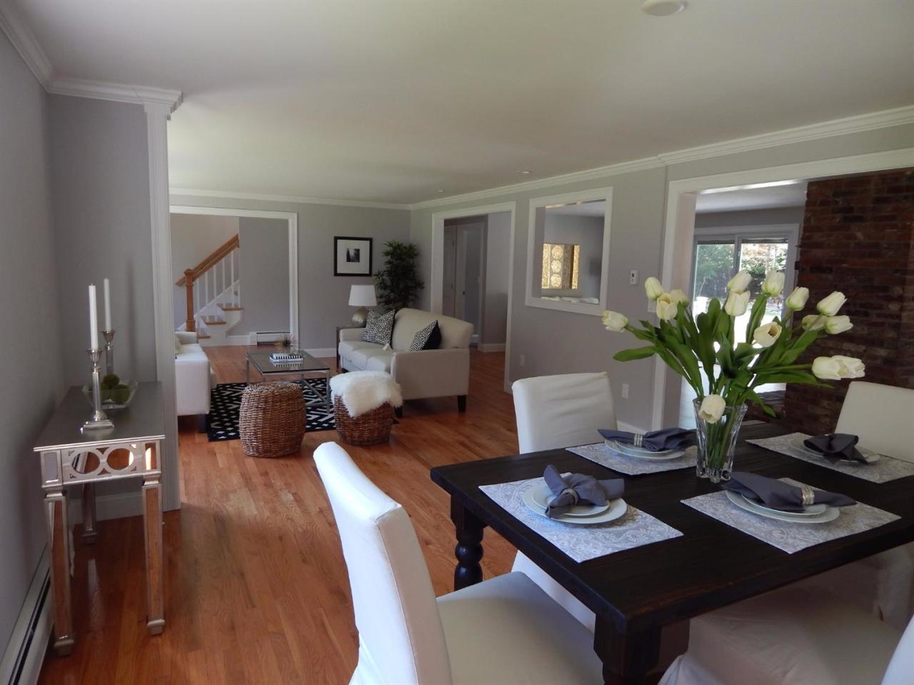 163 Fuller Road Centerville, MA 02632 - Photo 3 of 23 a view of a workspace with furniture and a couch