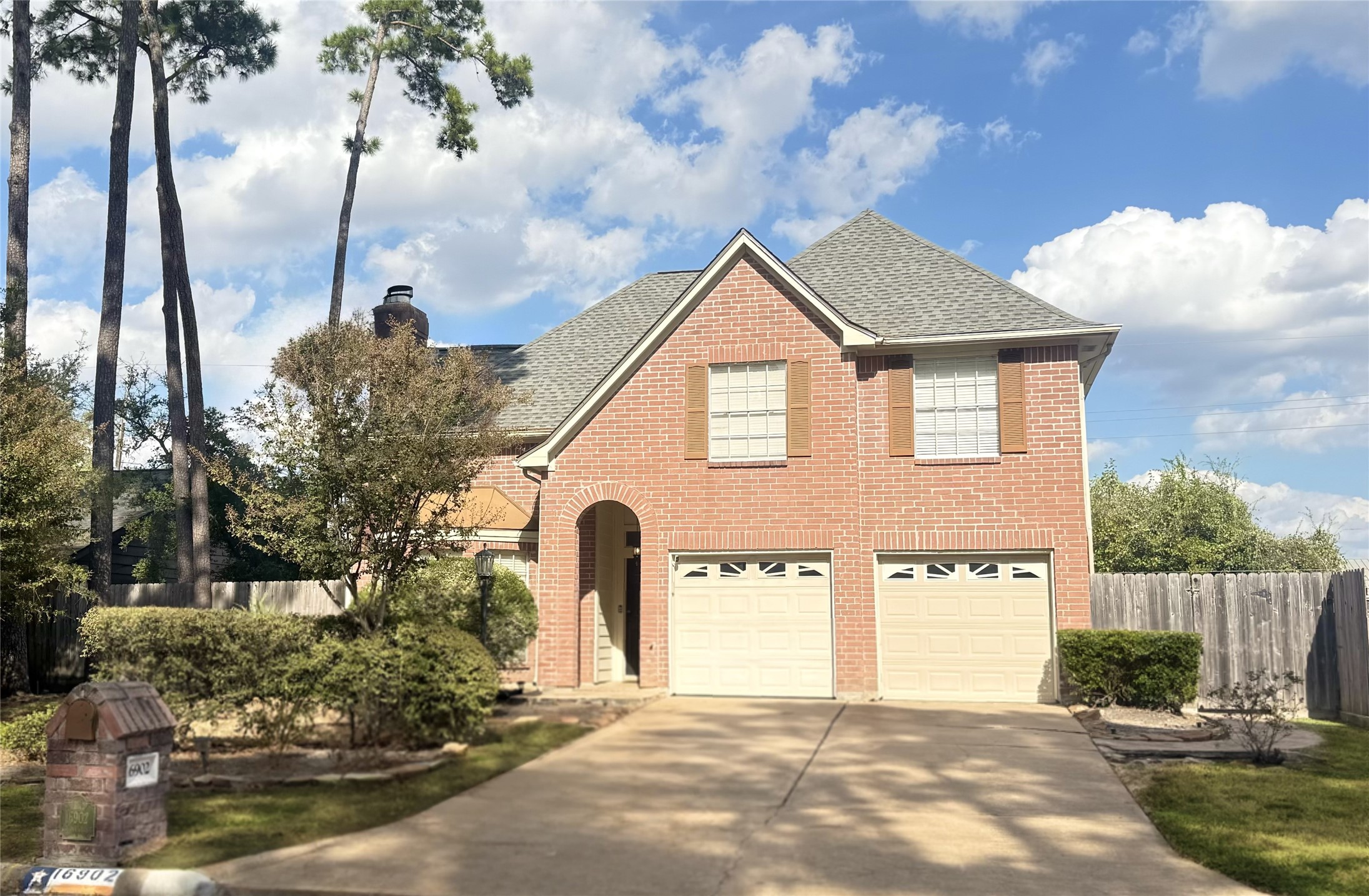 16902 Colony Creek Drive Spring, TX 77379 - Photo 1 of 18 a front view of a house with a yard and garage
