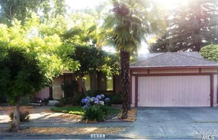 1933 Lariat Street Santa Rosa, CA 95403 - Photo 1 of 1 a view of backyard with a garden and palm trees