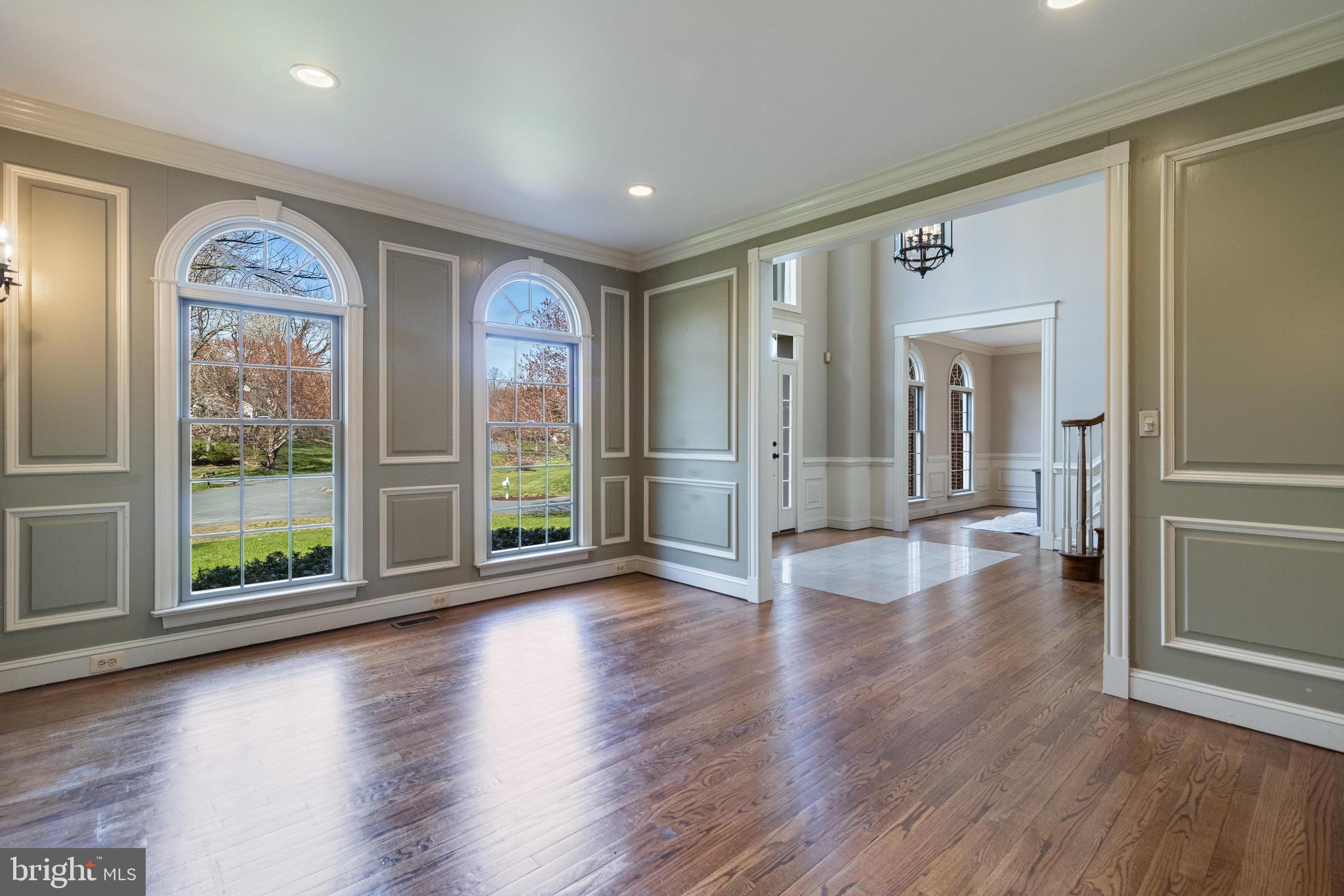 99 Hummingbird Court Dunkirk, MD 20754 - Photo 15 of 84 a view of a big room with wooden floor lake view and windows