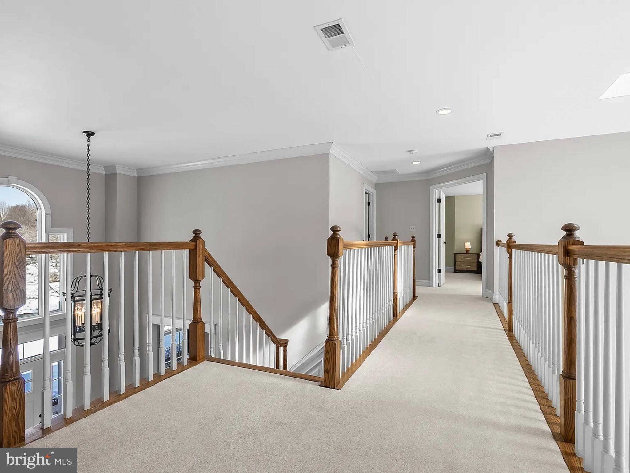 99 Hummingbird Court Dunkirk, MD 20754 - Photo 27 of 84 a view of a hallway with stairs