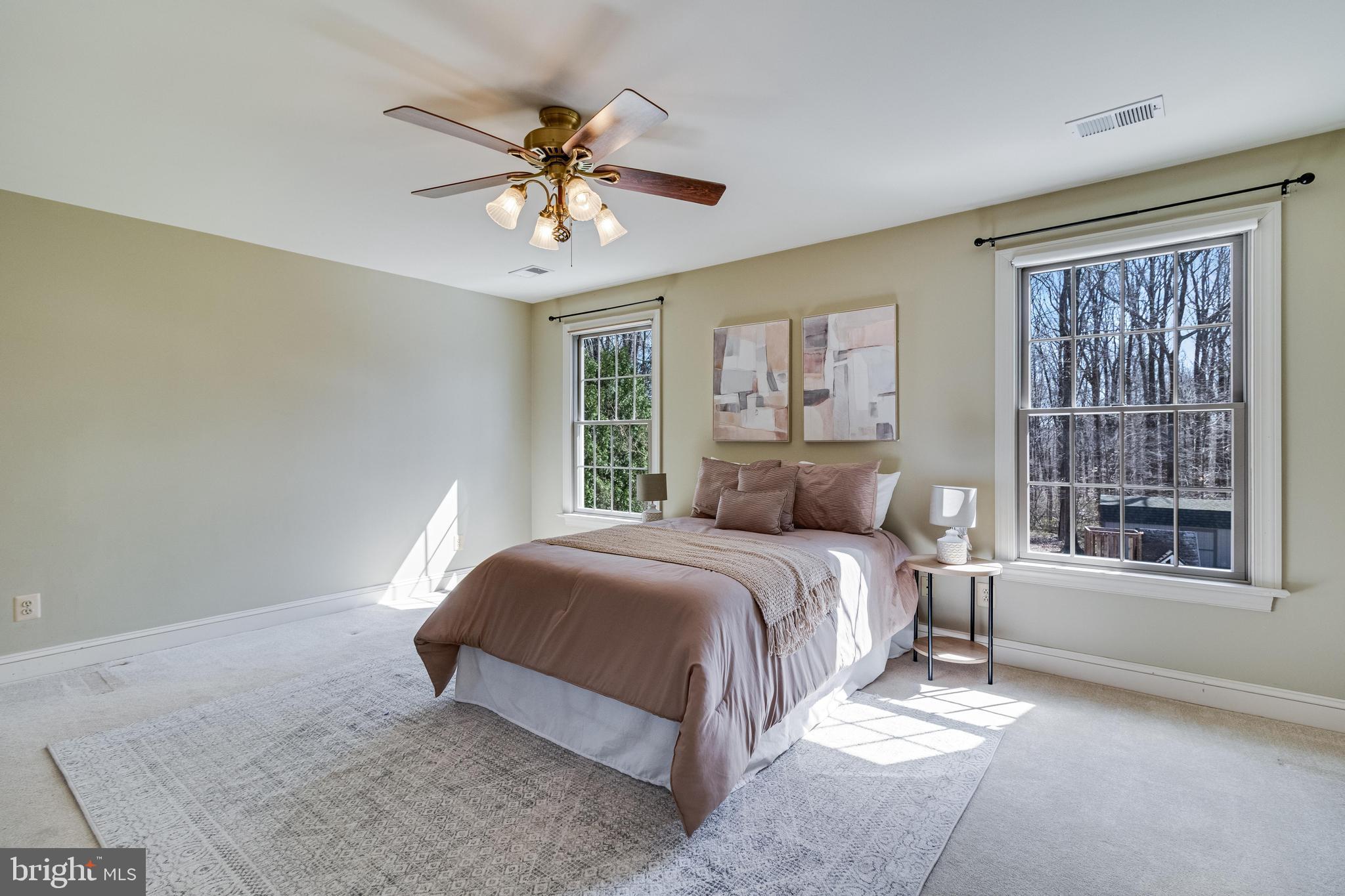 99 Hummingbird Court Dunkirk, MD 20754 - Photo 30 of 84 a spacious bedroom with a bed and window
