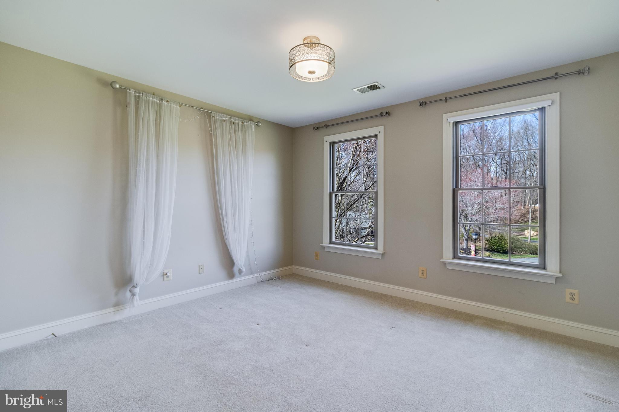 99 Hummingbird Court Dunkirk, MD 20754 - Photo 40 of 84 a view of an empty room with a window