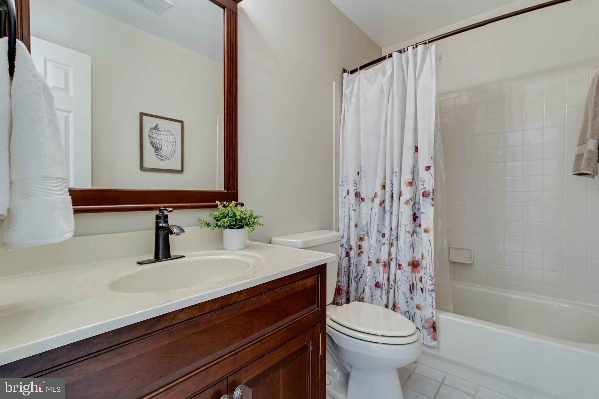 99 Hummingbird Court Dunkirk, MD 20754 - Photo 44 of 84 a bathroom with a sink a toilet and a bathtub