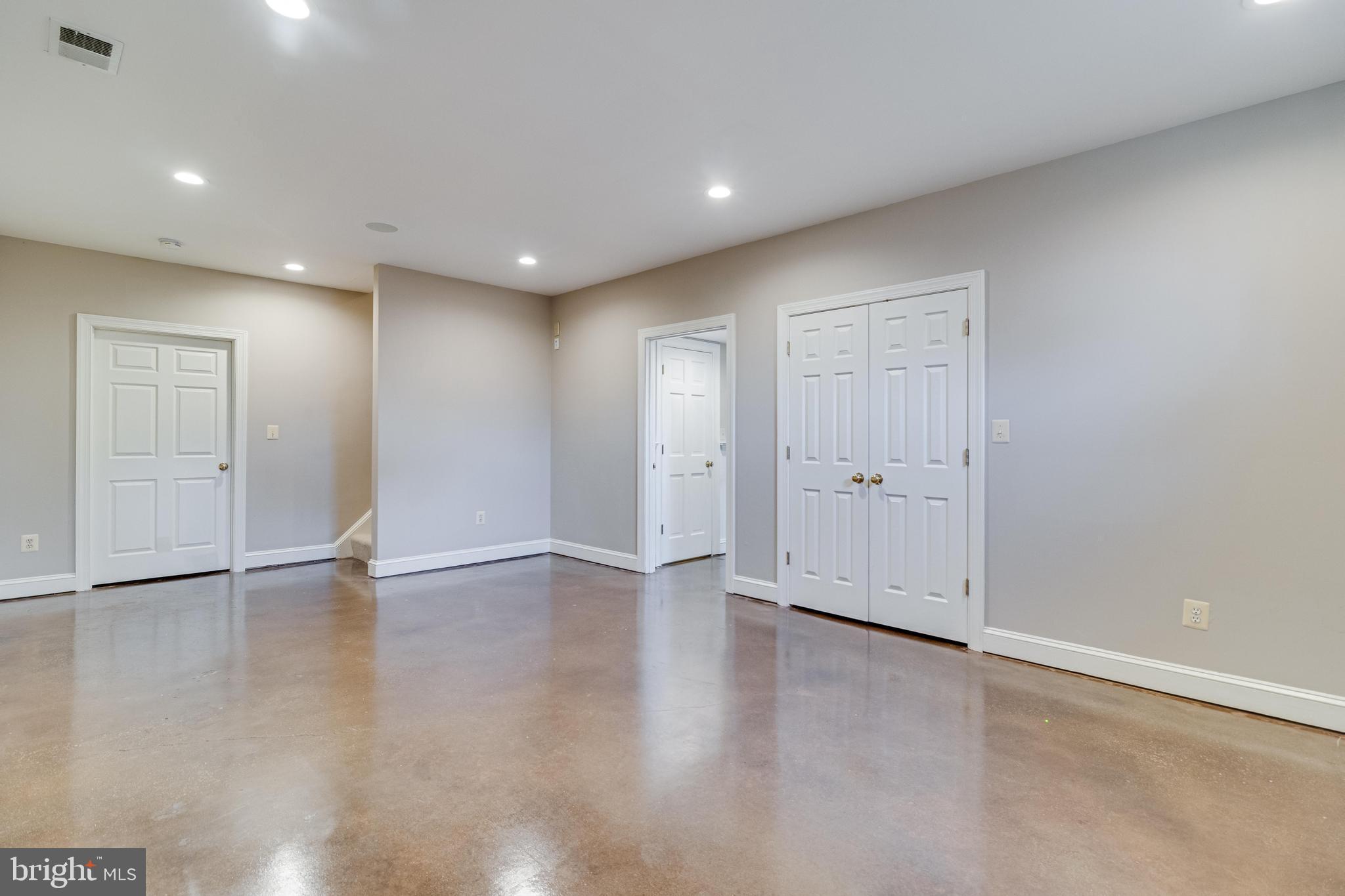 99 Hummingbird Court Dunkirk, MD 20754 - Photo 61 of 84 a view of an empty room with wooden floor