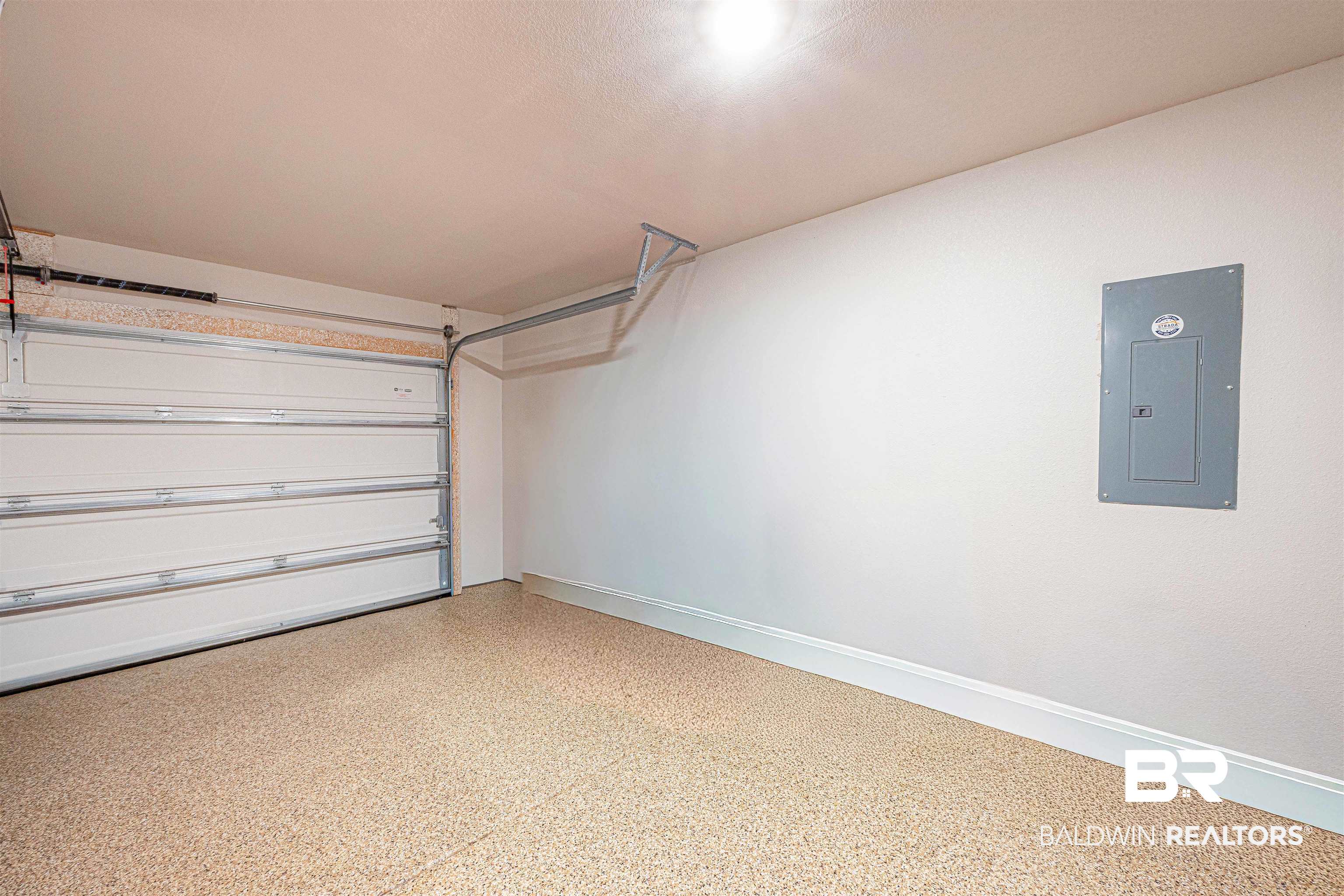 14843 Forsythia Loop Silverhill, AL 36576 - Photo 39 of 51 Garage featuring electric panel and baseboards