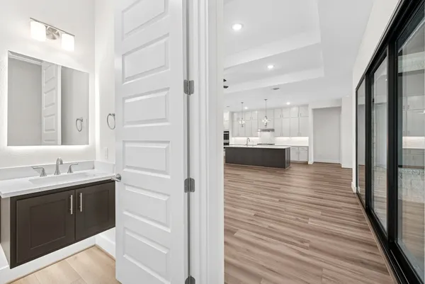 a bathroom with a sink and a mirror