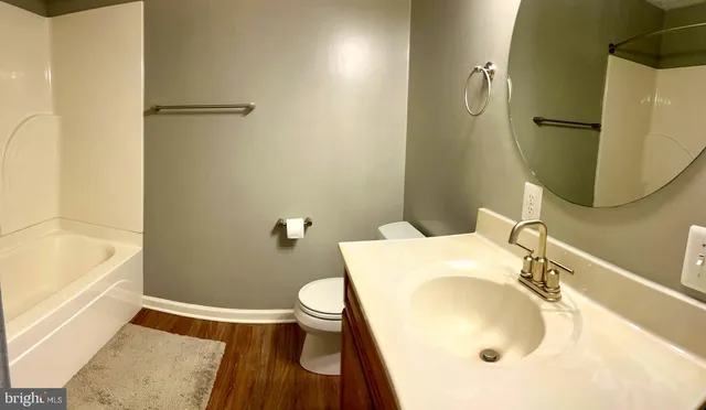 a bathroom with a sink and a tub