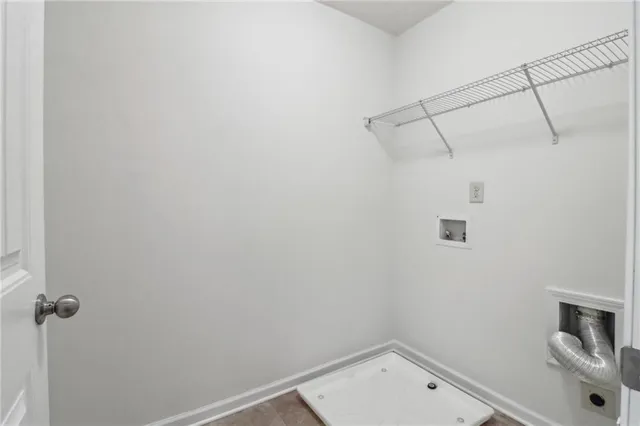 a small space with racks on the wall