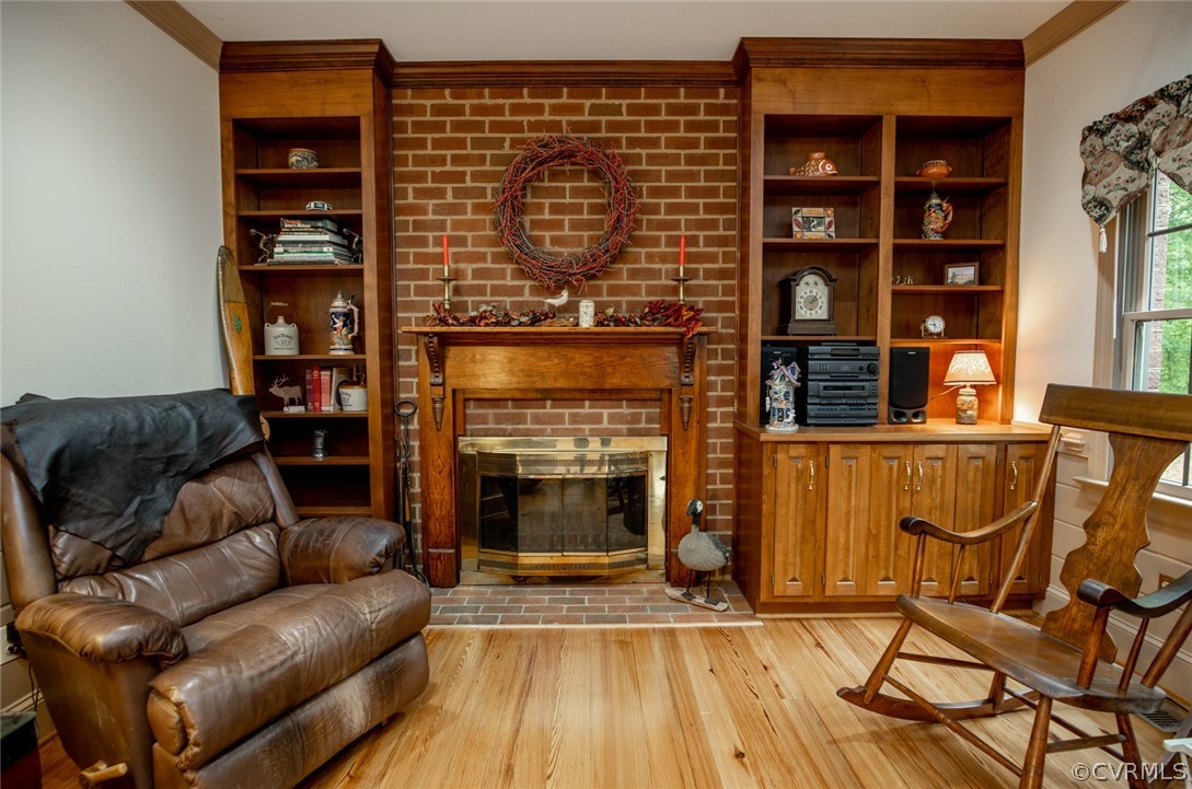 17268 White Pine Road Beaverdam, VA 23015 - Photo 9 of 50 Family room with wood floors, brick fireplace and