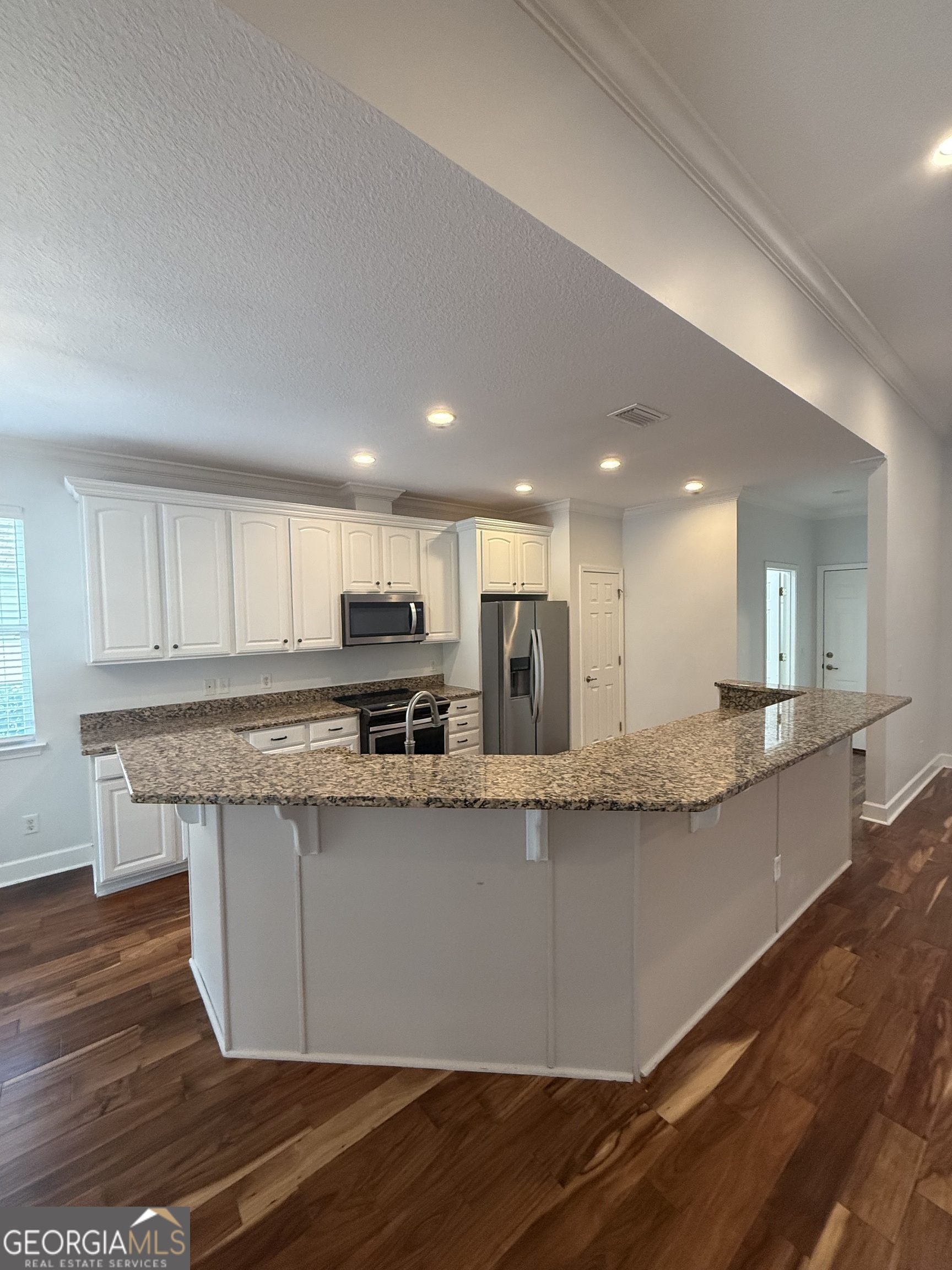 1603 Sandpiper Court St. Marys, GA 31558 - Photo 15 of 33 a view of kitchen with granite countertop window