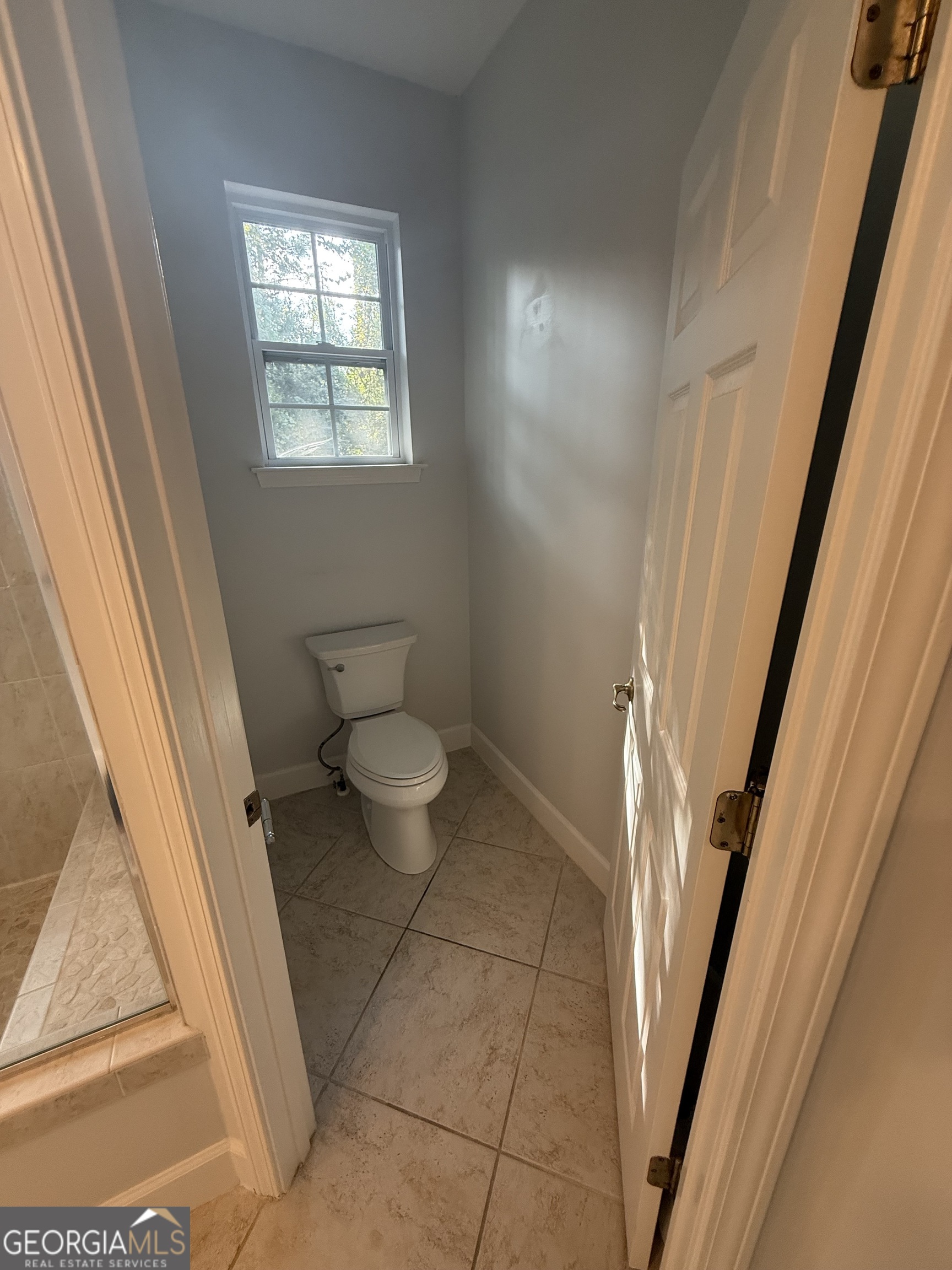 1603 Sandpiper Court St. Marys, GA 31558 - Photo 22 of 33 a bathroom with a sink and a toilet