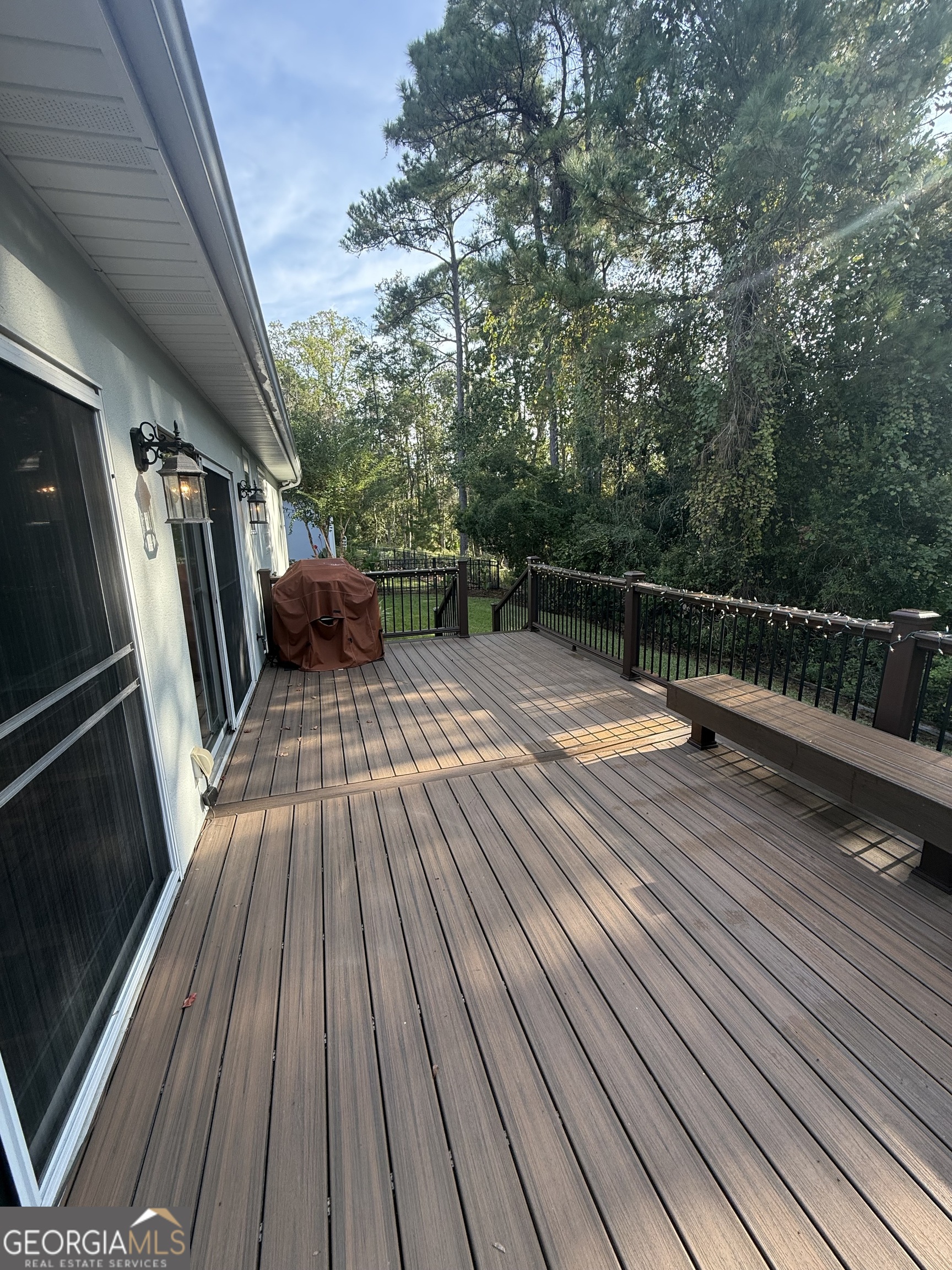 1603 Sandpiper Court St. Marys, GA 31558 - Photo 28 of 33 a view of balcony with wooden floor and outdoor seating