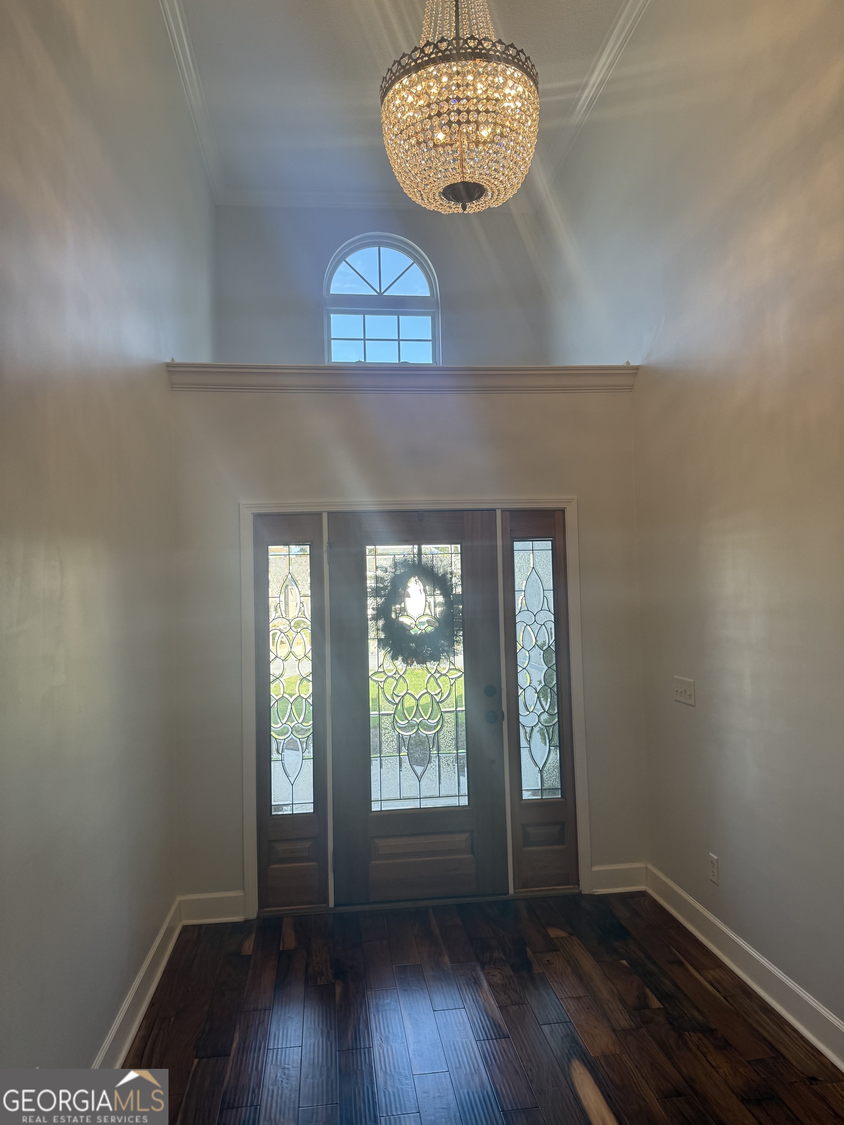 1603 Sandpiper Court St. Marys, GA 31558 - Photo 3 of 33 an empty room with wooden floor and windows