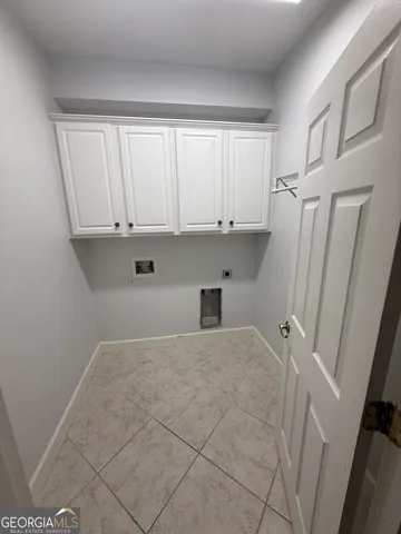 a view of a kitchen with a sink