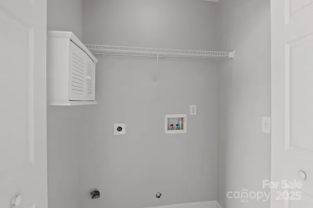 an empty room with windows mirror and windows