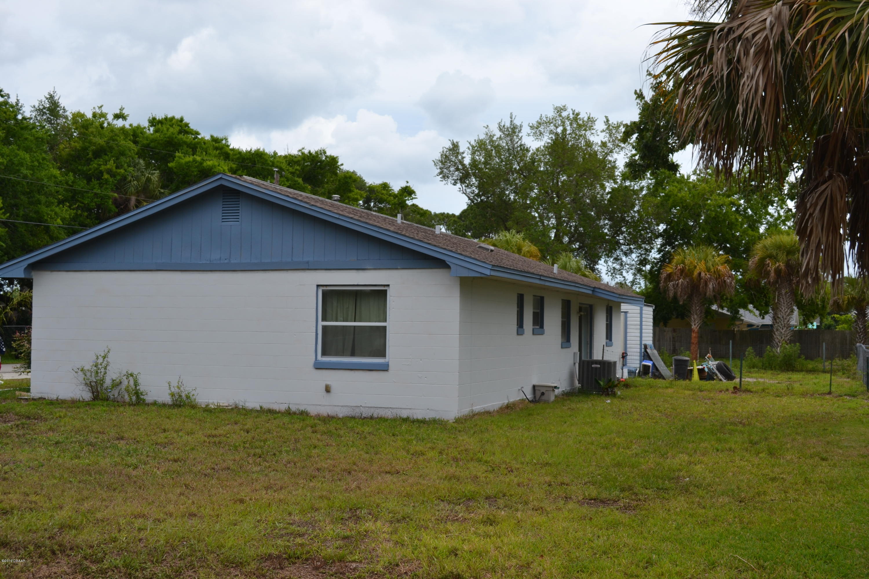 506 Eaton Road Edgewater, FL 32132 - Photo 21 of 23 Back Yard/Side View!