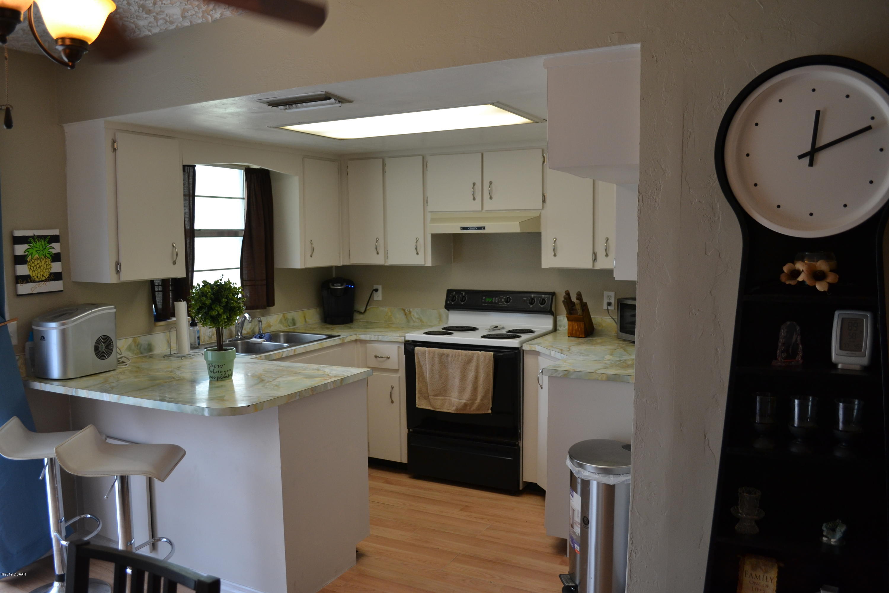 506 Eaton Road Edgewater, FL 32132 - Photo 8 of 23 Dining Area to Kitchen