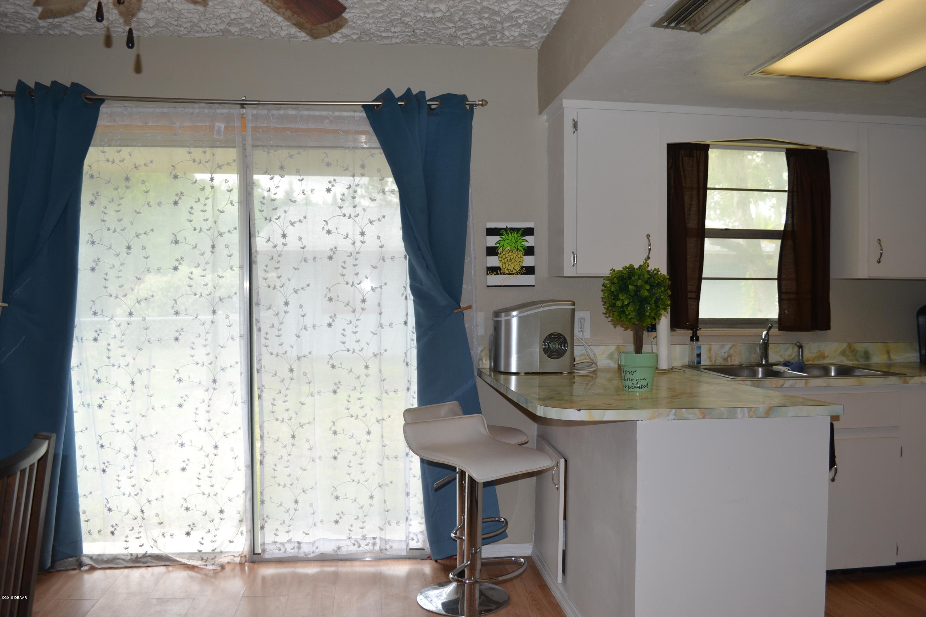 506 Eaton Road Edgewater, FL 32132 - Photo 9 of 23 Sliders to Back Porch