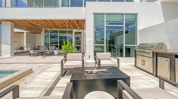 a view of a terrace with furniture