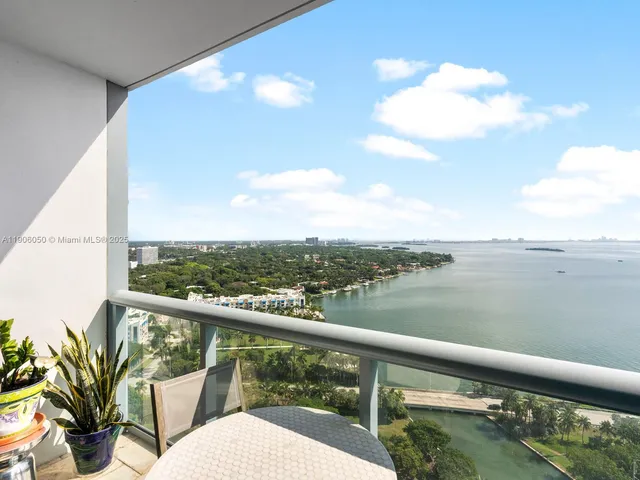 a view of lake and mountain