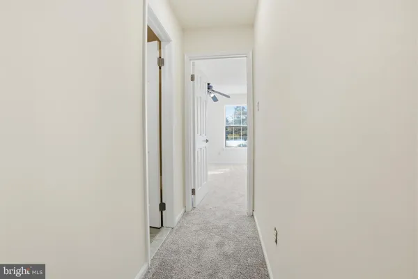 a view of a bathroom with toilet