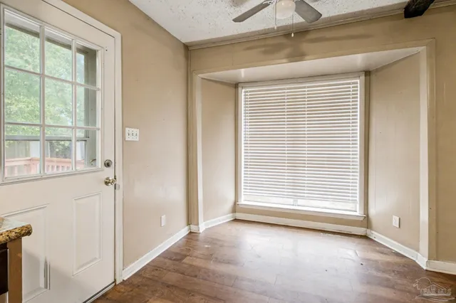 an empty room that has a window