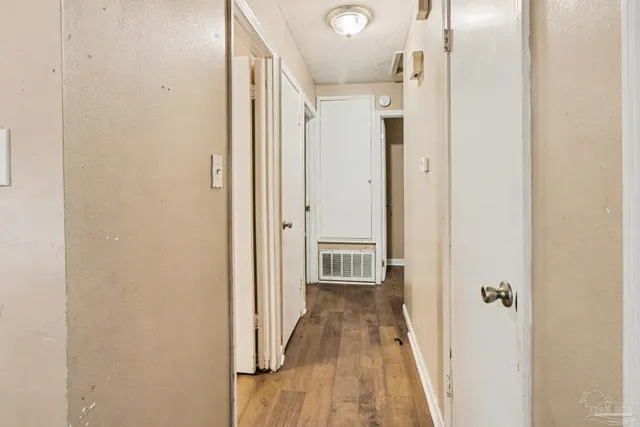 a view of a bathroom from a hallway