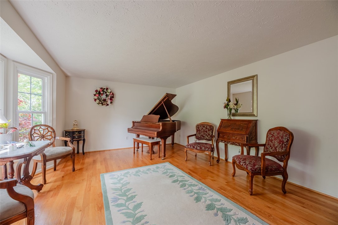 77 Misty Pine Road Perinton, NY 14450 - Photo 10 of 47 THE FORMAL LIVING ROOM IS VERY SPACIOUS AND ALSO H