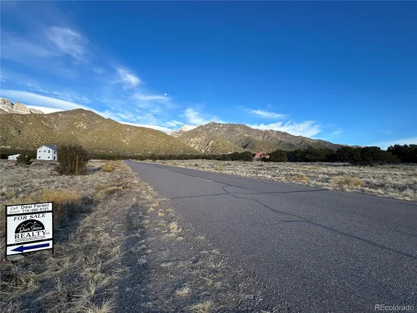 a view of a house with a mountain