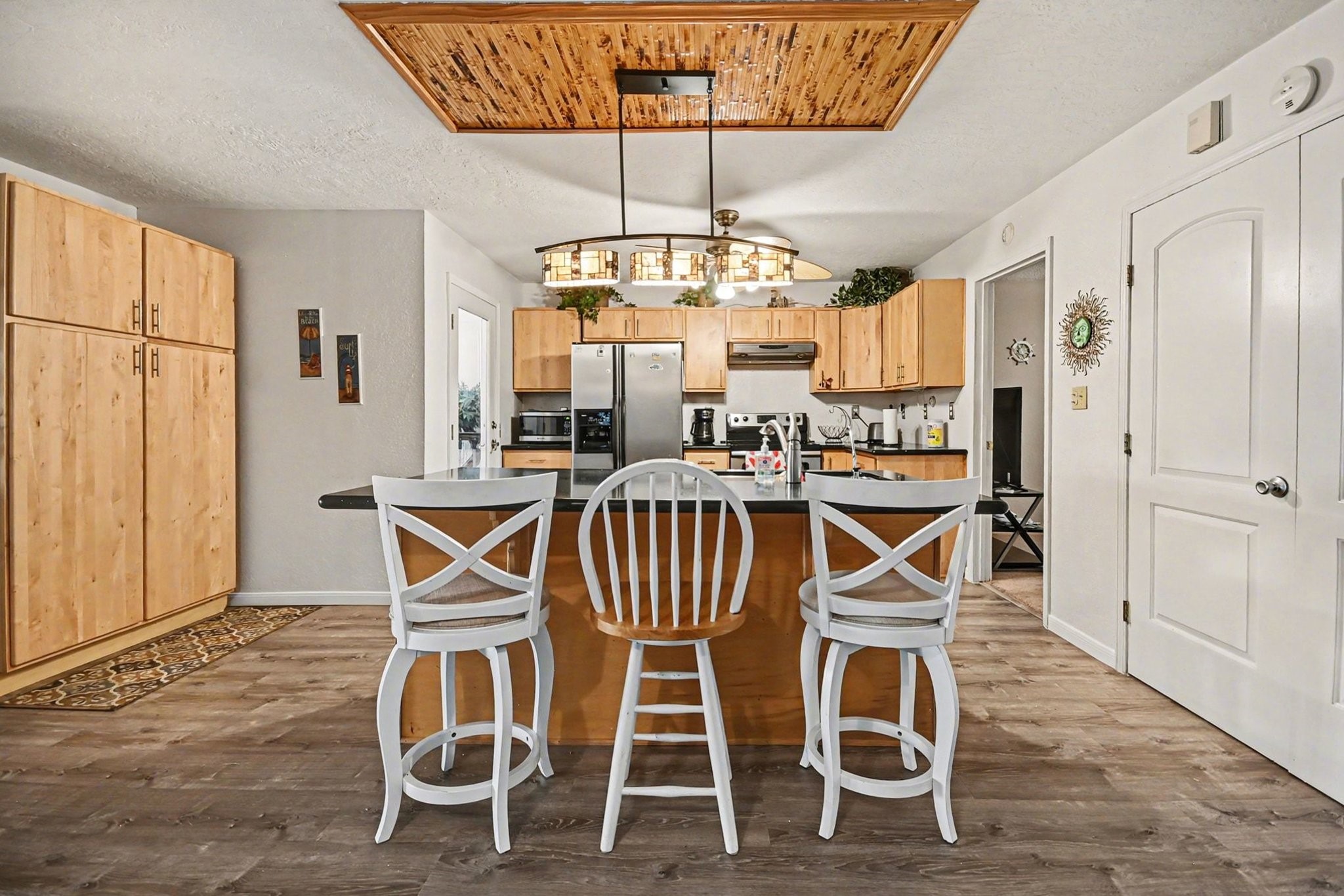 970 Wommack Drive Crystal Beach, TX 77650 - Photo 17 of 49 a view of a dining room with furniture window and outside view